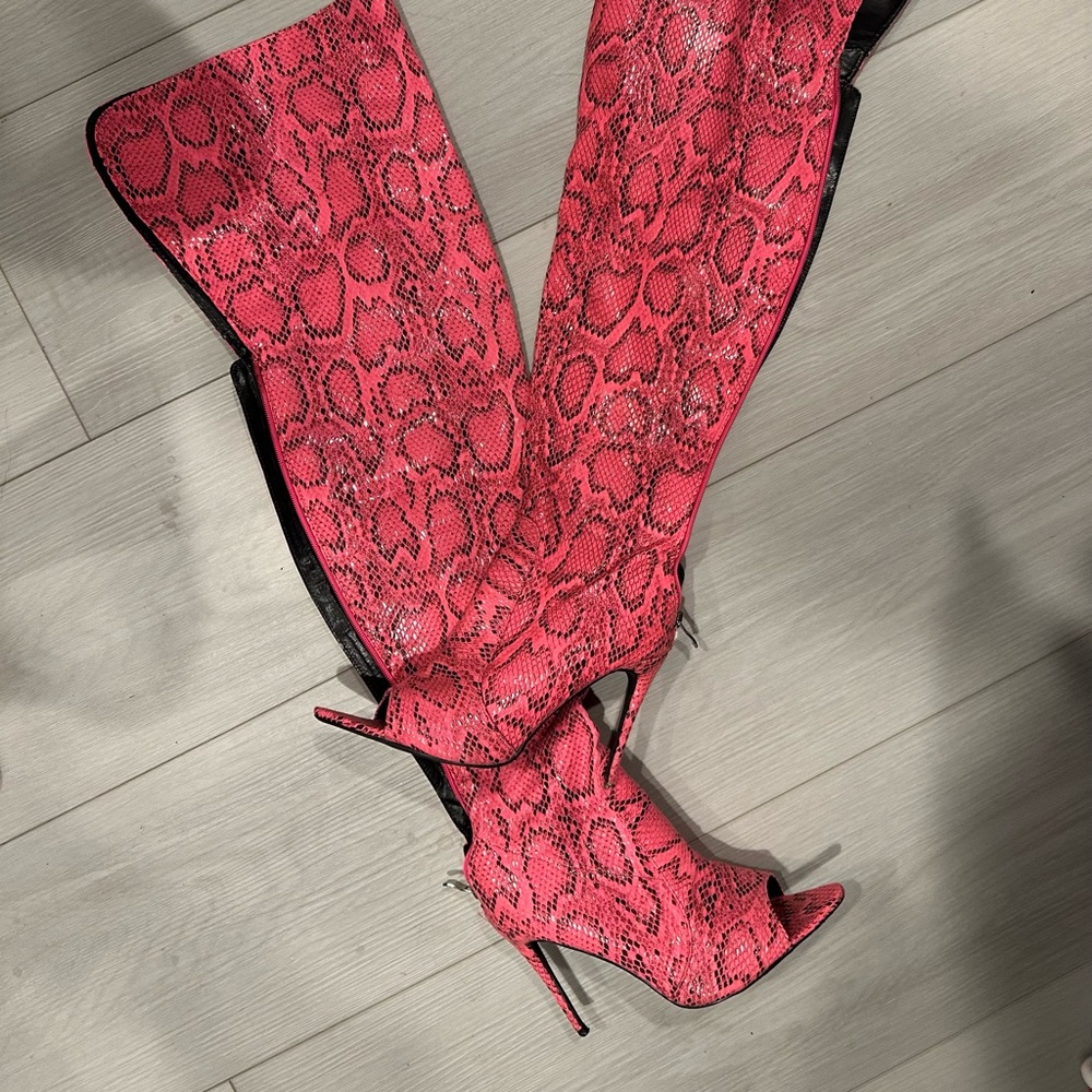 Neon pink high thigh high boots